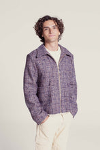Load image into Gallery viewer, Model wears a Bear Jacket made with wool check fabric; worn zipped up
