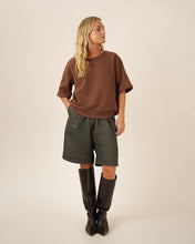 Load image into Gallery viewer, Model wears Bermuda Shorts: wide leg, knee-length
