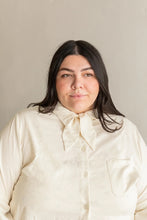 Load image into Gallery viewer, Close up of lady wearing Butano Button Up with small neckerchief and chest pocket
