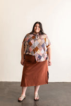 Load image into Gallery viewer, Lady wears a Butano Button Up with short sleeves and neckerchief
