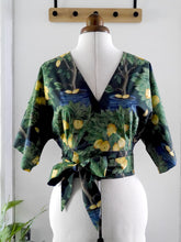 Load image into Gallery viewer, Elodie Wrap Top (on mannequin) with pleats at waistband, made up of Citrus Orchard Cotton Lawn Fabric
