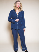 Load image into Gallery viewer, Lady stands wearing a Pyjama set with contrasting piping detail
