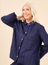 Load image into Gallery viewer, Lady wears pyjama top detail, button front fastened to the neck, with single chest breast pocket
