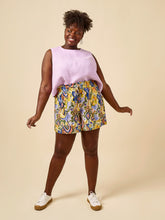 Load image into Gallery viewer, Model wears Sepia Shorts with large patch pockets and paperbag, drawstring waist

