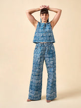 Load image into Gallery viewer, Model wears wide leg trousers with drawstring waist
