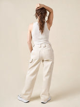 Load image into Gallery viewer, Back view of lady wearing Rika pants with utilitarian style pockets and tabs
