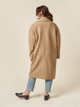 Load image into Gallery viewer, Back view of model wearing an oversized style coat
