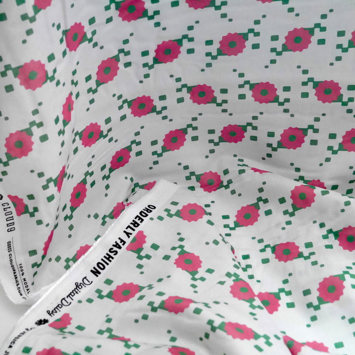 Modal Rayon fabric drapes down with a digital daisy design