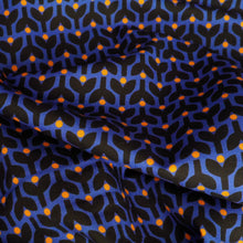 Load image into Gallery viewer, Organic cotton fabric crumpled up, with print of stems and dots in tessellating pattern
