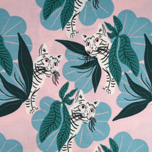 Load image into Gallery viewer, Close up of print, of cats peeping round large leaves on organic cotton fabric
