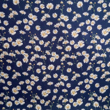 Load image into Gallery viewer, Flat display of Viscose Morracain Crepe fabric shows pattern design of daisies on a plain background
