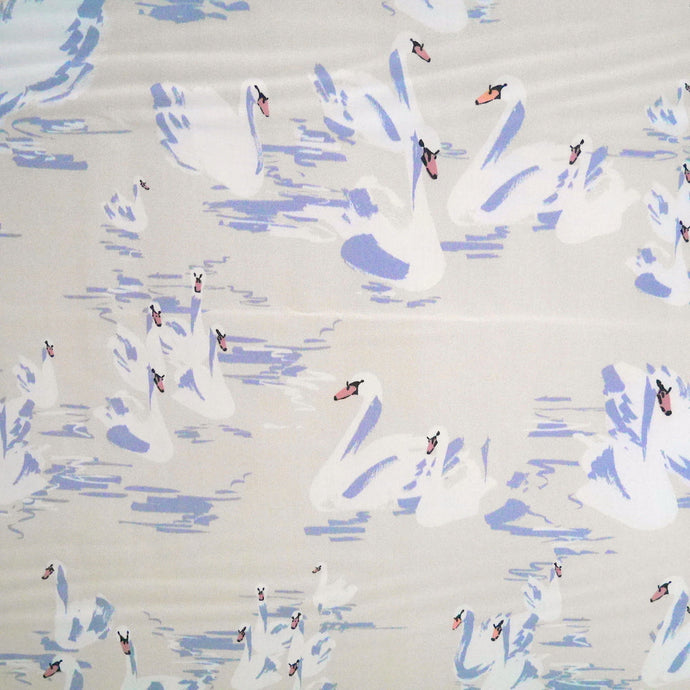 Cotton fabric with print of Swans gliding around