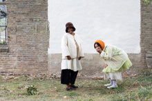 Load image into Gallery viewer, Two ladies laughing wearing quilted jackets
