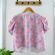 Load image into Gallery viewer, Short puff sleeve blouse made with Nenuphar Viscose fabric on hanger
