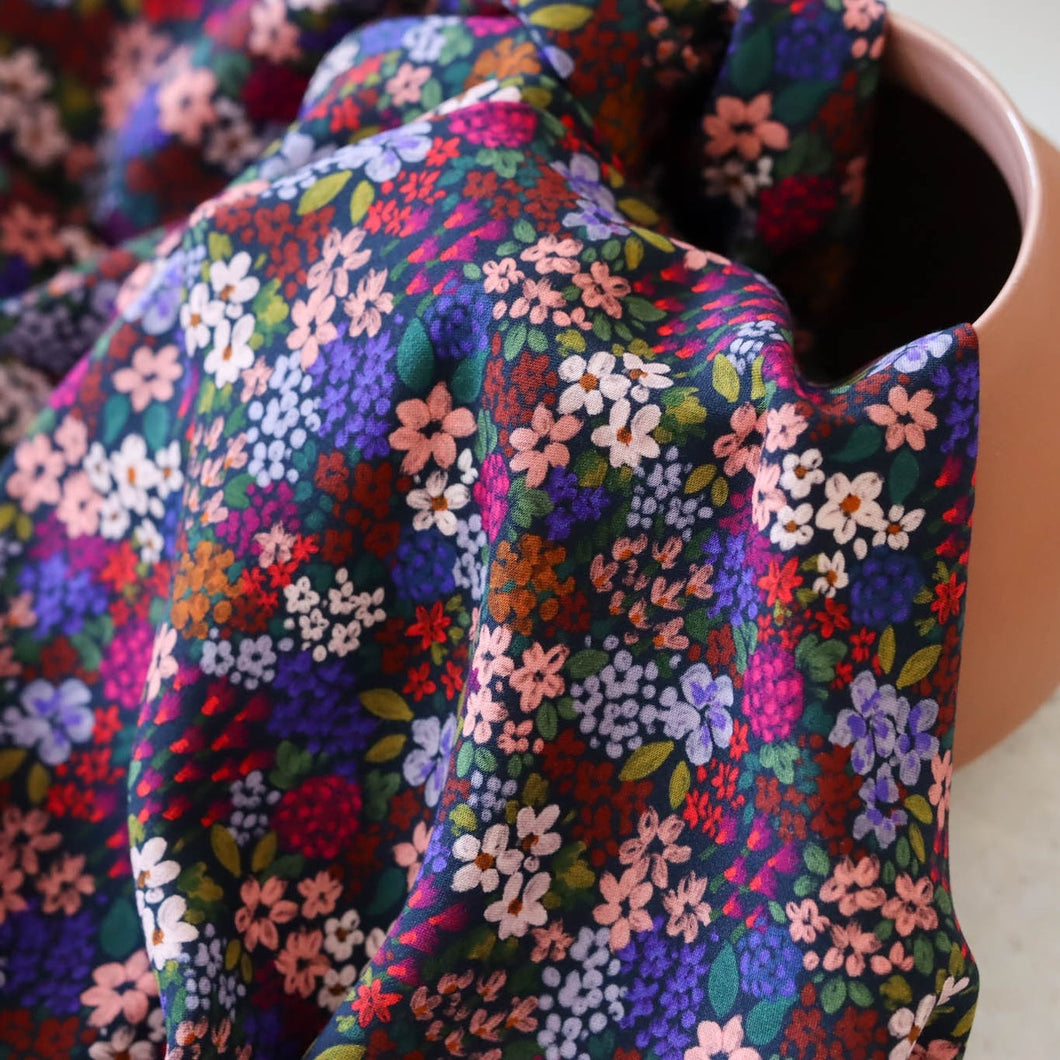 Floral printed Viscose fabric drapes in a pot