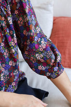 Load image into Gallery viewer, Sleeve detail of blouse made up in Enchanted Viscose floral print fabric
