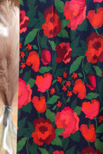 Load image into Gallery viewer, Floral pattern with red flowers on a dark blue background, viscose fabric draped
