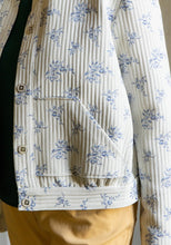 Load image into Gallery viewer, Close up of patch pocket on jacket front with diagonal opening
