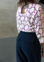 Load image into Gallery viewer, Back view of lady wearing Brooklyn trousers showing pockets with flaps
