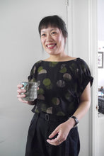 Load image into Gallery viewer, Lady wears a boat neck cuff sleeve top made with Jane Maple EcoVero Viscose fabric
