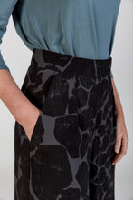 Load image into Gallery viewer, Close up detail of Flint trousers at waist, showing hand in side pocket
