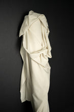 Load image into Gallery viewer, Bolt of cotton linen fabric stood against wall with fabric draped over the end
