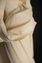 Load image into Gallery viewer, Close up of Organic Cotton Hemp Fabric shows soft handle and plain weave
