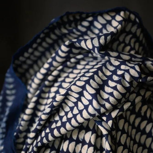 Indigo, organic cotton fabric with white geometric handblock pattern