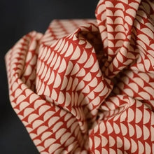 Load image into Gallery viewer, Close up of geometric pattern handblock, organic cotton fabric crumpled
