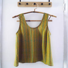 Load image into Gallery viewer, Sleeveless vest on hanger made with Franklin Block cloth
