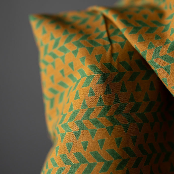 Handblock printed fabric with triangle patterns