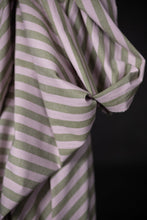 Load image into Gallery viewer, Close up of striped, organic cotton/linen fabric with green and pink stripes on a black background
