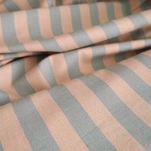 Load image into Gallery viewer, Striped, organic cotton and linen blend fabric, displayed with soft folds
