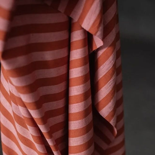 Close up of dual-tone stripe cotton/linen fabric in drape