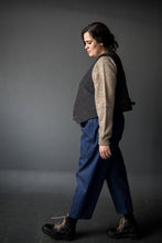 Load image into Gallery viewer, Side view of lady wearing a soft waistcoat open, layered over jumper
