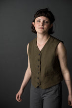 Load image into Gallery viewer, Lady wears a soft waistcoat with welt pockets
