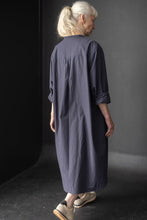 Load image into Gallery viewer, Back view of lady wearing Niven shirtdress with yoke, and rolled up sleeves
