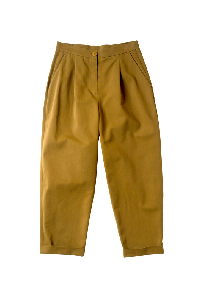 Peg trousers displayed flat on contrasting colour background