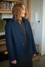 Load image into Gallery viewer, Model wears a blazer standing indoors with a bookshelf in the background
