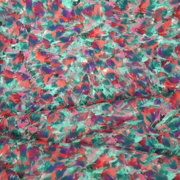 Cotton Lawn fabric with a multicoloured brushstroke effect, abstract print; fabric displayed with drape