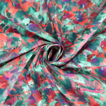 Load image into Gallery viewer, Cotton Lawn fabric with a multicoloured brushstroke effect, abstract print; fabric displayed with central swirl
