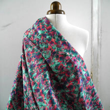 Load image into Gallery viewer, Cotton Lawn fabric with a multicoloured brushstroke effect, abstract print; fabric displayed draped on mannequin
