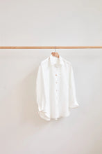 Load image into Gallery viewer, Classic Shirt hangs on a wooden hanger on a wooden rail
