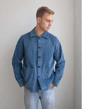 Load image into Gallery viewer, Model stands wearing a buttoned up jacket with collar, and patch pockets
