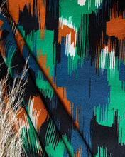 Load image into Gallery viewer, Viscose Twill fabric displayed in soft folds 
