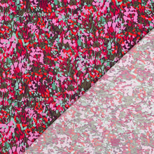 Load image into Gallery viewer, Colorful Garden Digital Print Viscose Fabric shown with the reverse side laid on top
