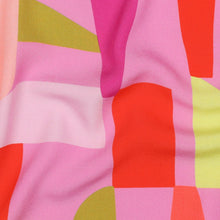 Load image into Gallery viewer, Close up of Shape Shifter Viscose Fabric shows various block shapes in different colours print
