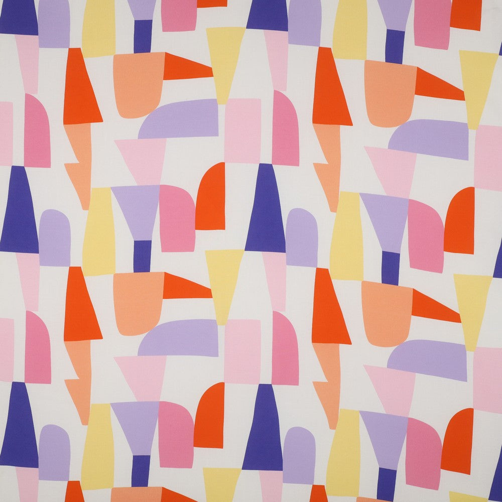 Eco Viscose fabric displayed flat with abstract geometric pattern of various irregular shapes