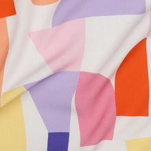 Load image into Gallery viewer, Close-up image of Eco Viscose fabric with abstract geometric pattern of various irregular shapes
