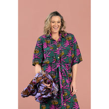 Load image into Gallery viewer, Lady wears a short sleeve shirt dress made with Manifesto Viscose fabric
